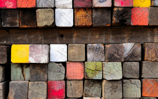 Wood pile colored squares sign - texture free wallpaper