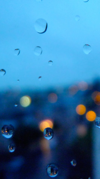 Window rain drops city buildings - free rain wallpaper for mobile