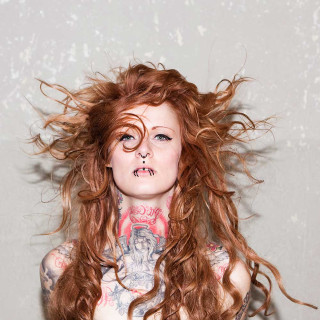 Woman tattoos piercings body head - fashion photography free wallpaper for tablet