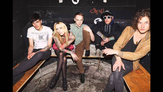 Group people bench room graffiti - the wall behind them free wallpaper