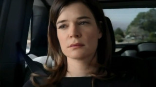 Woman sitting car concerned look - her face and shoulder free wallpaper