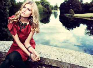 Woman sitting lake trees sky - a ledge next free wallpaper