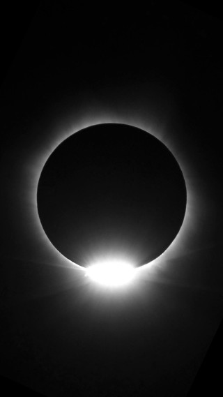 Solar eclipse sky black white - free dark wallpaper