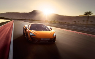 Sports car sunshine mountains road - the sun shining behind free wallpaper