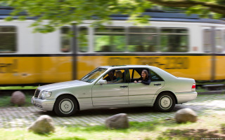 Woman driving car street yellow - a train free wallpaper
