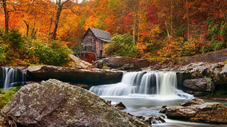 Waterfall house stream rocks background - a waterfall free wallpaper