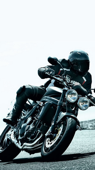 Man motorcycle street rock wall - panfuturism free wallpaper for mobile