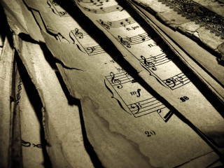 Musical notes pen fluxus baroque - a close up of a bunch free wallpaper