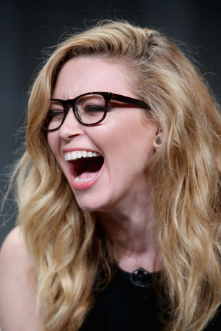 Woman laughing glasses blonde jewelry - glass free wallpaper