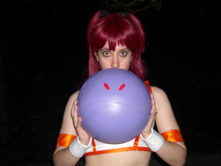 Red hair woman purple ball - a purple ball free wallpaper