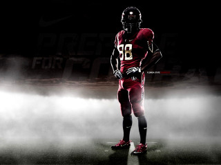 Football player uniform field fog - a football player in a uniform free wallpaper