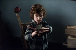 Young boy holding knife wooden - evan charlton free wallpaper