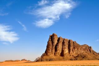 Large rock formation desert blue - a blue sky above free wallpaper