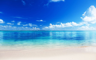 Beach blue sky clouds ocean - a blue ocean free wallpaper