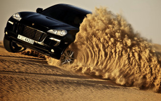 Black car desert sand explosion - a desert area free wallpaper