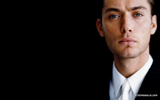 Man suit tie serious expression 7 - beautiful bone structure free wallpaper