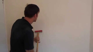 Man holding paint roller wall - action painting free wallpaper