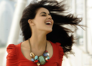 Woman necklace smiling waving hair 2 - a red top free wallpaper