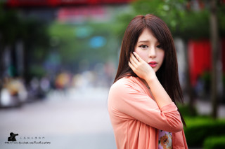 Serious asian woman longhair bangs - art photography free wallpaper