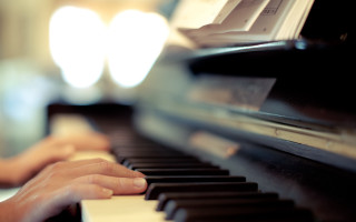 Child playing piano hands keys - a piano free wallpaper