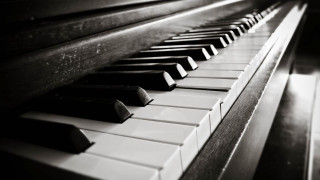 Piano closeup black white keys - cinematic composition free wallpaper for desktop