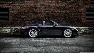 Black sports car yellow rims 2 - a black roof free wallpaper