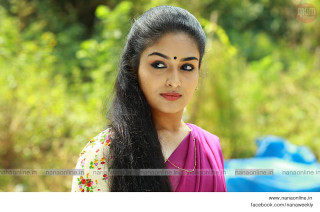 Woman long hair pink shirt 3 - a forest background free wallpaper