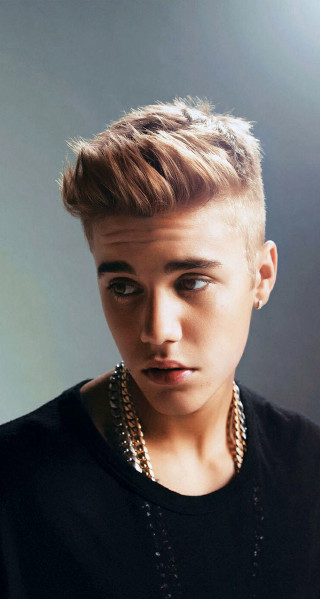 Young man short haircut serious - perfect face free wallpaper for mobile