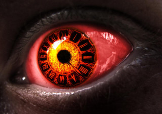 Cat eye clock iris closeup - red eye free wallpaper for desktop