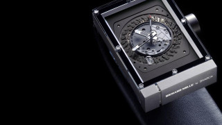 Black leather watch kinetic art - a watch free wallpaper