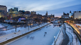 City skyline river snow people - eric deschamps free wallpaper