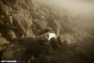 White yellow truck driving rocky - truck free wallpaper