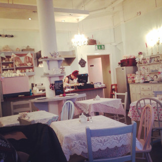 Woman working restaurant counter table - free vintage wallpaper for tablet