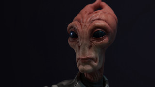 Red alien mask closeup black - a close up of a person free wallpaper for desktop