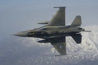 Fighterjet mountainrange sky snow polarizing - over a mountain range in the sky free wallpaper
