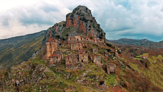 Mountain tall rock formation buildings - cagnaccio di san pietro free wallpaper