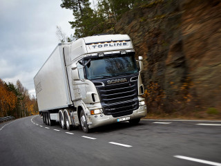 White truck driving road forest - a white truck free wallpaper
