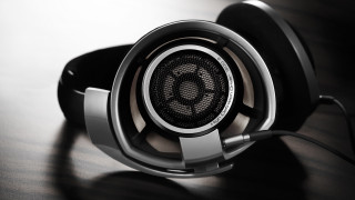 Headphones closeup black background logo - headphone free wallpaper