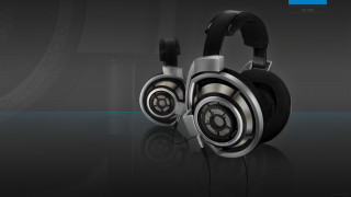Headphones black background blue white 2 - a pair of headphones free wallpaper