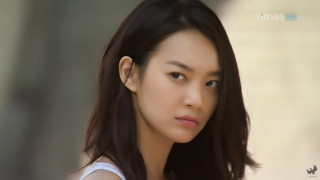 Woman longhair whiteTop serious look - a white top free wallpaper