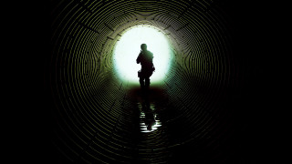 Person standing dark tunnel bike - a dark tunnel free wallpaper