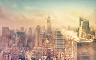 City skyline tall buildings cloudy - a cloudy sky in the background free wallpaper for desktop