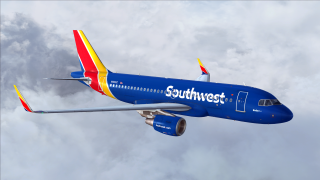 Southwest plane clouds blue tail - a yellow stripe free wallpaper