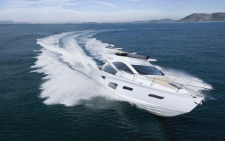 White boat traveling water mountain - a mountain in the distance free wallpaper