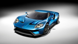 Blue sports car studio black 2 - a studio photo free wallpaper