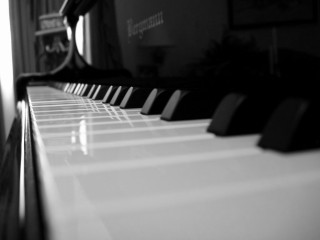 Piano black white keys clock - a piano free wallpaper
