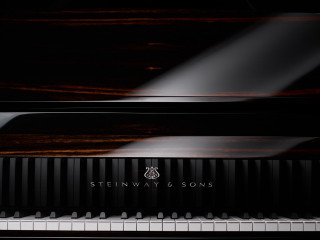 Piano blackcase whitekeyboard logo blackbackground - a piano free wallpaper