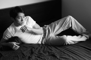 Man laying bed hands chest - his foot free wallpaper