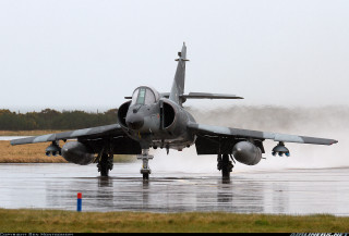 Jet plane runway rain smoke - a jet plane free wallpaper