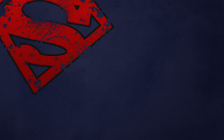 Red superman logo blue background - grungy free wallpaper